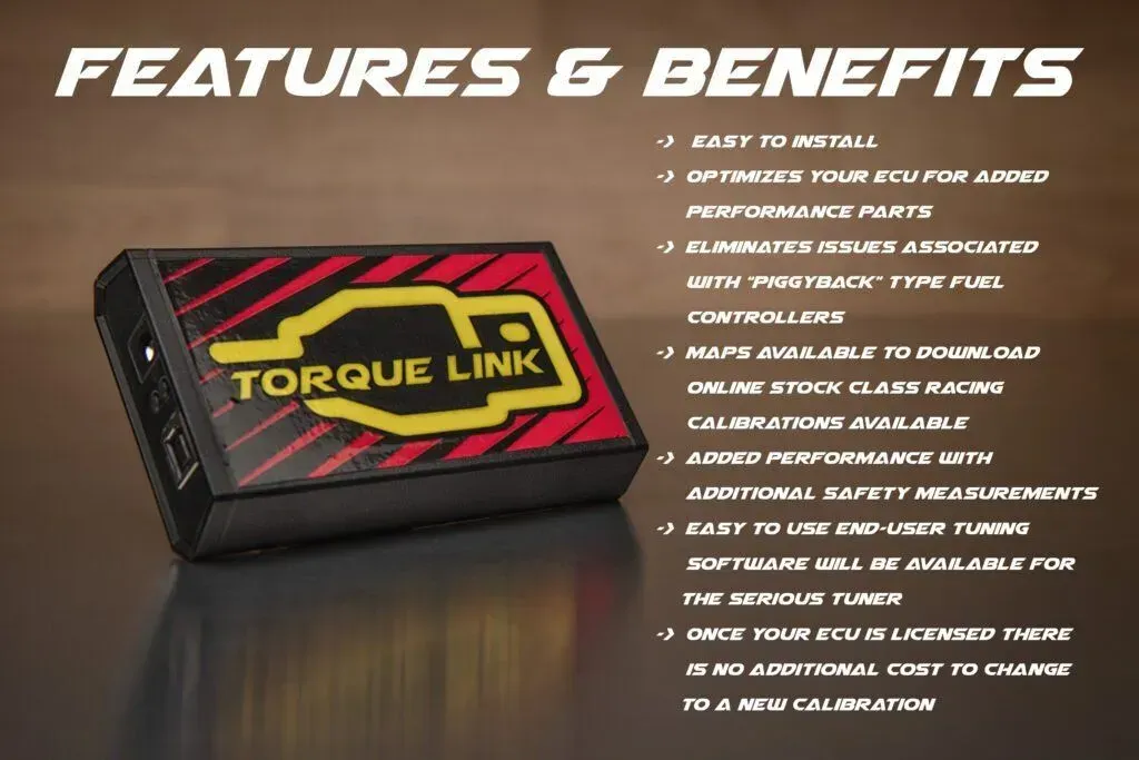 Torque Link tuning device with features and benefits list. Black, red, and yellow device on a reflective surface.